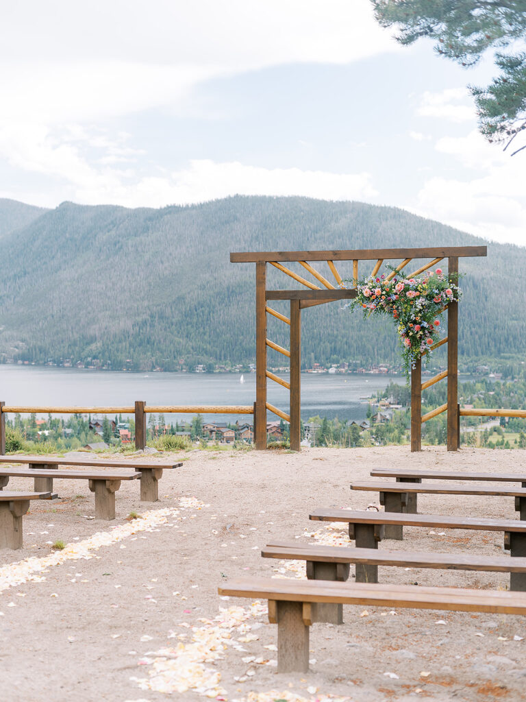 outdoor Colorado wedding reception with mountains and lake