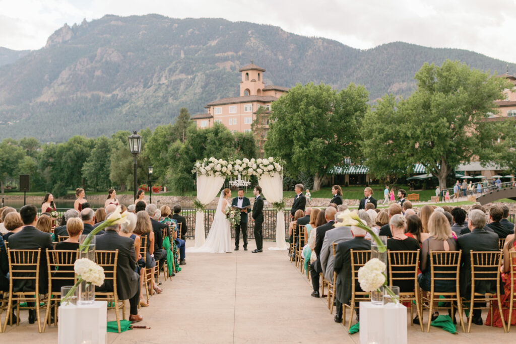 outdoor wedding ceremony at Broadmoor luxury hotel Colorado