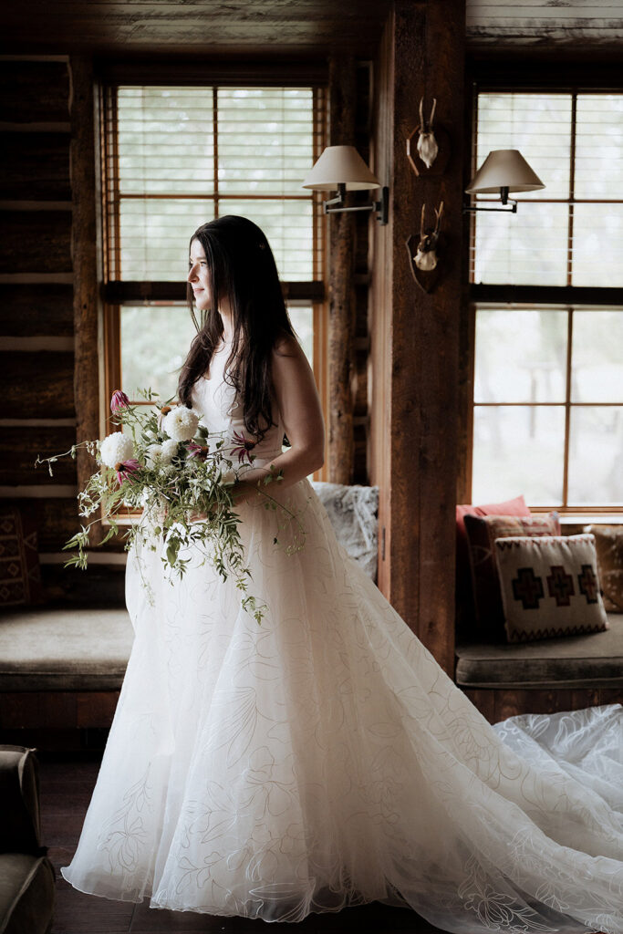 bridal photo at Magee Homestead lodge at Brush Creek Ranch wedding