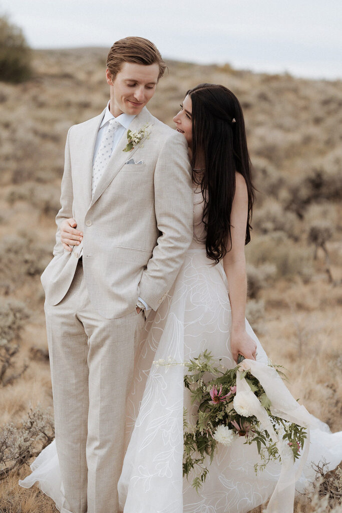 bride and groom at brush creek ranch wedding WY