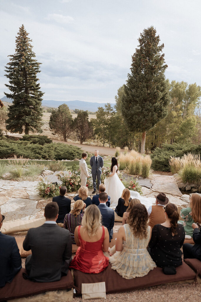 Magee Ranch outdoor wedding ceremony at Brush Creek Ranch